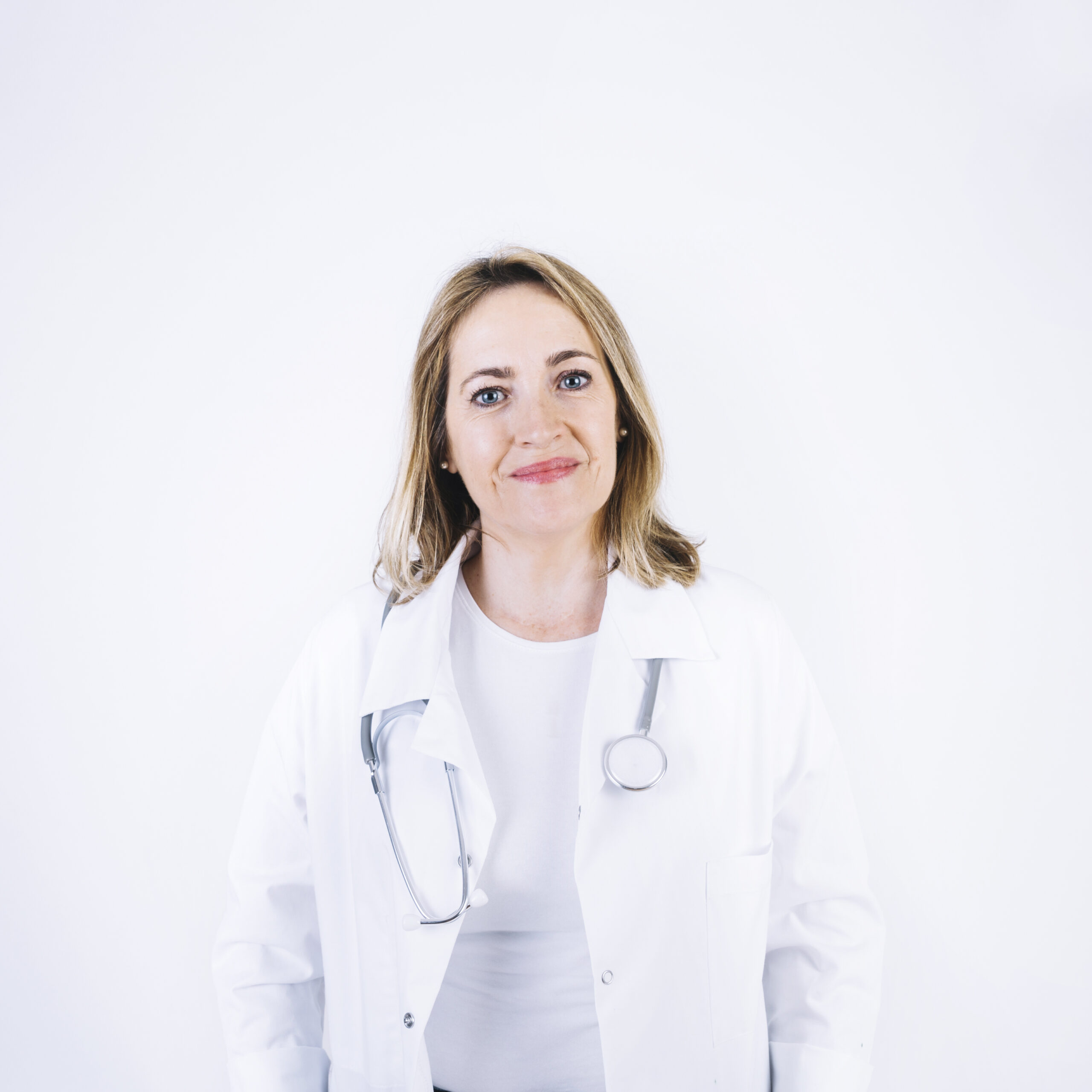 friendly-doctor-looking-camera